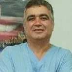 Dt. Müşfik Kemikcioğlu — Diş Hekimi, Muratpaşa, Antalya. Portre fotoğrafı.