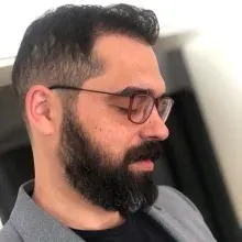 Prof. Dr. İhsan Doğan — Beyin Ve Sinir Cerrahisi, Ankara. Portre fotoğrafı.