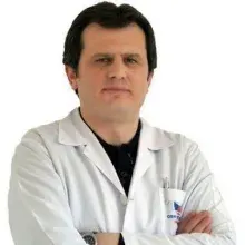 Uzm. Dr. Gürhan Güreser — Fiziksel Tıp Ve Rehabilitasyon. Portre fotoğrafı.