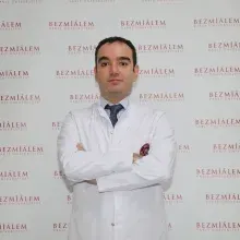 Dr. Öğr. Üyesi Enver Kunduz — Genel Cerrahi. Portre fotoğrafı.