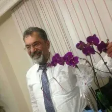 Dr. Alper Arıkazan — Psikiyatri, Antalya. Portre fotoğrafı.