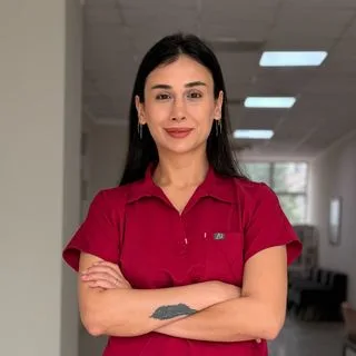 Op. Dr. Eda Sevinç Aslan Aygün — Kadın Hastalıkları Ve Doğum, Adana. Portre fotoğrafı.
