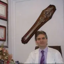 Uzm. Dr. Bekir Özbilim — Antalya. Portre fotoğrafı.