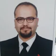 Dt. Mustafa Üstek — Diş Hekimi, Arnavutköy, İstanbul. Portre fotoğrafı.