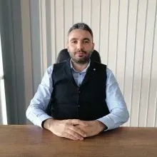 Uzm. Dr. Mustafa Erdoğan — Psikiyatri, Antalya. Portre fotoğrafı.