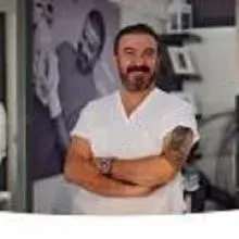 Uzm. Dr. Ali Öner Erdoğdu — İzmir. Portre fotoğrafı.