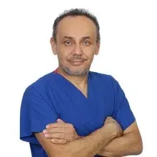 Uzm. Dr. Tufan Türk — Romatoloji, Denizli. Portre fotoğrafı.