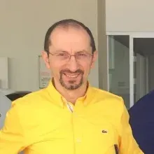 Prof. Dr. Güngör Karagüzel — Çocuk Cerrahisi, Konyaaltı, Antalya. Portre fotoğrafı.