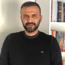 Psk. Dan. Emir Atay — Psikolojik Danışma ve Rehberlik. Portre fotoğrafı.