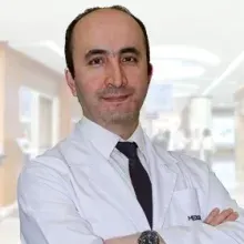 Doç. Dr. Burak Uz — Çankaya, Ankara. Portre fotoğrafı.