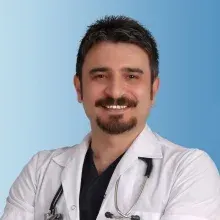 Uzm. Dr. Ertuğrul Kerimoğlu — Sualtı hekimliği ve hiperbarik tıp, Bursa. Portre fotoğrafı.