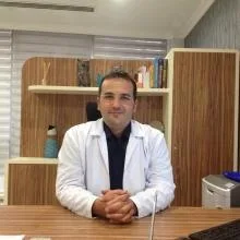 Op. Dr. Özgen Kıvanç — Plastik Rekonstrüktif Ve Estetik Cerrahi, İstanbul. Portre fotoğrafı.