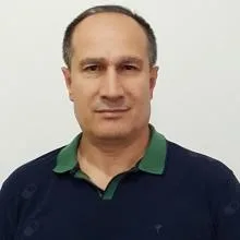 Prof. Dr. Mehmet Karaca — Antalya. Portre fotoğrafı.