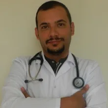 Doç. Dr. Ahmet Uludağ — Tıbbi Genetik, İstanbul. Portre fotoğrafı.