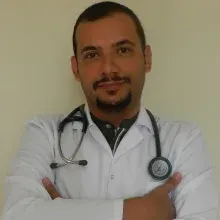 Doç. Dr. Ahmet Uludağ — Tıbbi Genetik, İstanbul. Portre fotoğrafı.