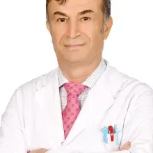 Prof. Dr. Emin Özbek — Üroloji, İstanbul. Portre fotoğrafı.