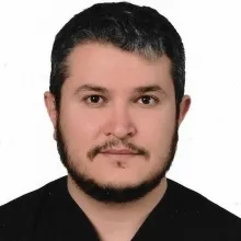 Dt. Serdar Demirçal — Diş Hekimi, İzmir. Portre fotoğrafı.