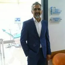 Doç. Dr. Mustafa Göregen — İzmir. Portre fotoğrafı.