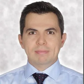 Prof. Dr. Serdar Kesikburun — Fiziksel Tıp Ve Rehabilitasyon, Ankara. Portre fotoğrafı.
