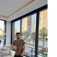 Dt. Ali Duru — Diş Hekimi, Adana. Portre fotoğrafı.