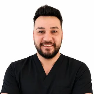 Dt. Ali İhsan Çetin — Diş Hekimi, Kayseri. Portre fotoğrafı.