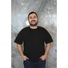 Dt. Anılcan Aygün — Diş Hekimi, Antalya. Portre fotoğrafı.
