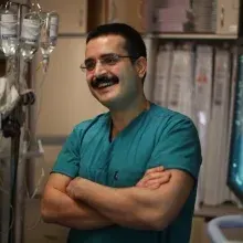 Op. Dr. İnan Mutlu — Kardiyoloji, Buca, İzmir. Portre fotoğrafı.