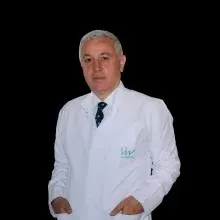 Op. Dr. Çetin Arık — Kadın Hastalıkları Ve Doğum, Ankara. Portre fotoğrafı.