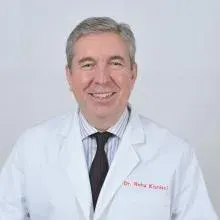 Prof. Dr. Reha Kişnişci — Ağız Diş Ve Çene Cerrahisi, Ankara. Portre fotoğrafı.