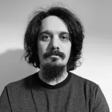 Uzm. Psk. Dan. Erkan Alkan — Psikolojik Danışma ve Rehberlik. Portre fotoğrafı.
