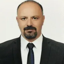 Op. Dr. Hüseyin Ergin — Üroloji. Portre fotoğrafı.