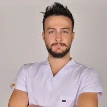 Dt. Tolga Turgut — Diş Hekimi, Aydın. Portre fotoğrafı.