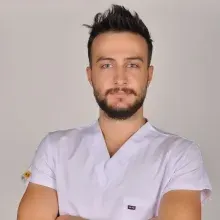Dt. Tolga Turgut — Diş Hekimi, Aydın. Portre fotoğrafı.