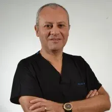 Prof. Dr. Alp Gurbet — Bursa. Portre fotoğrafı.