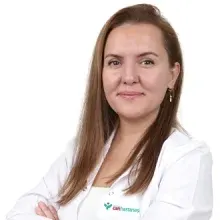 Uzm. Dr. Huriye Begüm Güney — Çocuk Sağlığı Ve Hastalıkları, Çiğli, İzmir. Portre fotoğrafı.