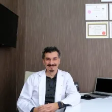 Dr. Dt. Oğuz Süleyman Özdemir — Nilüfer, Bursa. Portre fotoğrafı.