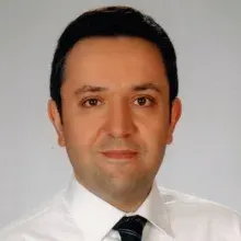 Prof. Dr. Ş. Kerem Özel — Çocuk Cerrahisi, Bağcılar, İstanbul. Portre fotoğrafı.