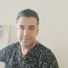 Op. Dr. Fikret İrkin — Genel Cerrahi, İstanbul. Portre fotoğrafı.
