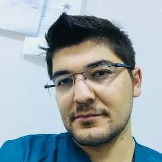 Uzm. Dr. Cemal Aydoğan — Radyoloji. Portre fotoğrafı.