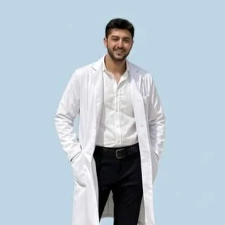 Uzm. Dr. Muhammed Emin Güzel — İç Hastalıkları. Portre fotoğrafı.