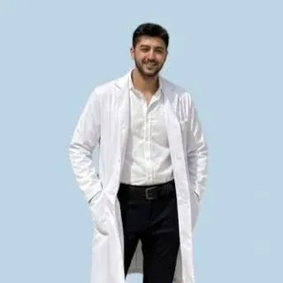 Uzm. Dr. Muhammed Emin Güzel — İç Hastalıkları. Portre fotoğrafı.