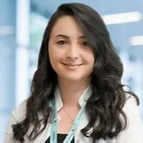 Uzm. Dr. Selin Ayşe İpek Baş — Çocuk ve Ergen Psikiyatrisi, Antalya. Portre fotoğrafı.