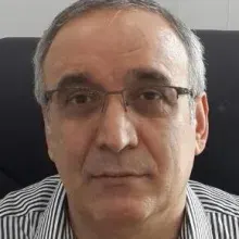 Uzm. Dr. Ahmet Hasanzade — Bakırköy, İstanbul. Portre fotoğrafı.