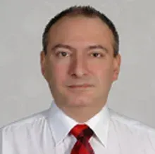 Prof. Dr. Babür Dora — Nöroloji, Konyaaltı, Antalya. Portre fotoğrafı.