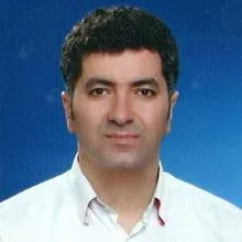 Prof. Dr. Emin Kapı — Adana. Portre fotoğrafı.