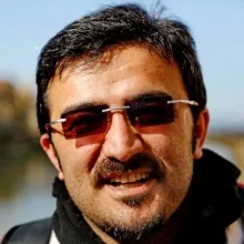 Uzm. Dr. Tayfun Zeren — Psikiyatri, Sarıçam, Adana. Portre fotoğrafı.