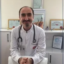 Uzm. Dr. Dinçer Erdinç — Adana. Portre fotoğrafı.