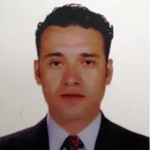 Prof. Dr. Abdullah Seçkin Ertuğrul — Periodontoloji, İzmir. Portre fotoğrafı.