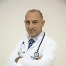 Op. Dr. Müşteba Sevil — Üroloji, İstanbul. Portre fotoğrafı.