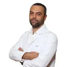 Uzm. Dr. Aydın Öztürk — Çocuk Sağlığı Ve Hastalıkları, İstanbul. Portre fotoğrafı.